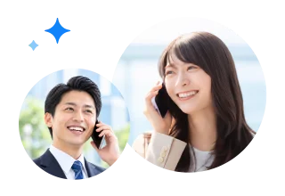 携帯電話で通話するビジネスパーソン